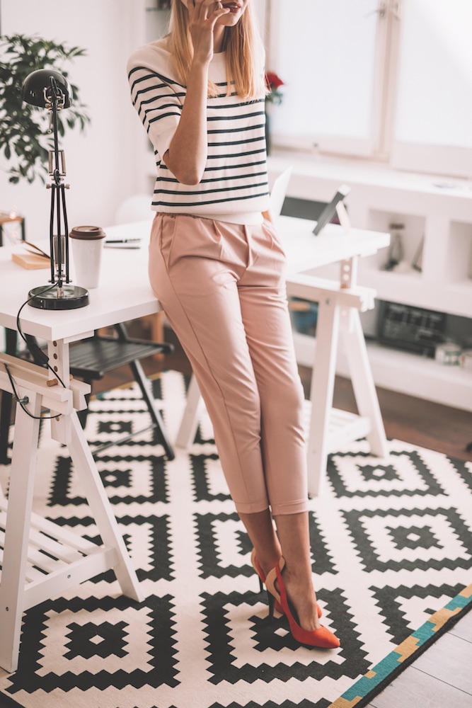 Modern woman working in her office The working mom's handbook, Pregnancy & Newborn