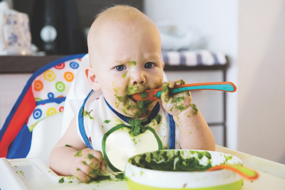 Feeding. Baby’s first solid food How to make baby food, picture of a baby eating, Pregnancy & Newborn